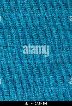 textile vertical background - interlacing threads in wool jersey knitted fabric close up Stock Photo
