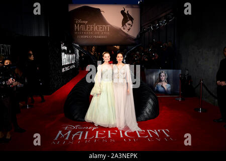 Elle Fanning (left) and Angelina Jolie attending the Maleficent: Mistress of Evil European Premiere held at Imax Waterloo in London. Picture date: Wednesday October 9, 2019. See PA story SHOWBIZ Maleficent. Photo credit should read: Ian West/PA Wire Stock Photo