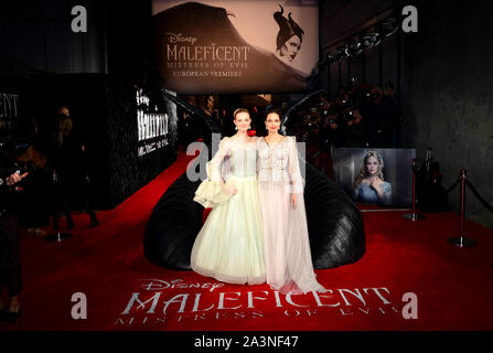 Elle Fanning (left) and Angelina Jolie attending the Maleficent: Mistress of Evil European Premiere held at Imax Waterloo in London. Picture date: Wednesday October 9, 2019. See PA story SHOWBIZ Maleficent. Photo credit should read: Ian West/PA Wire Stock Photo