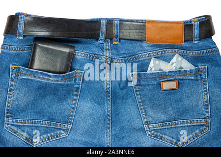 Credit cards with a wallet in jeans pockets. Stock Photo