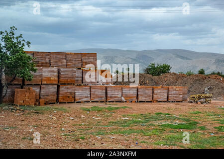 Warehouse of hollow ceramic bricks. Construction base. Stock Photo