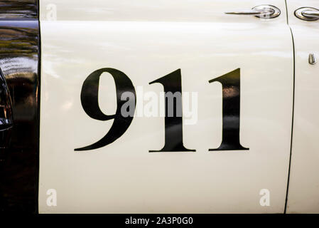 911 text on side of a police car. 911 Emergency response police car. Stock Photo