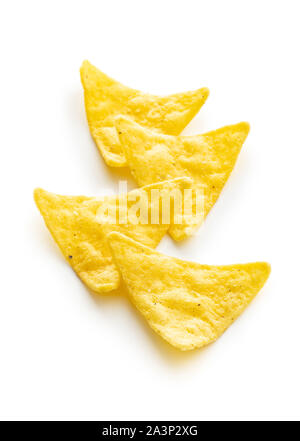 Corn nacho chips. Yellow tortilla chips isolated on white background. Stock Photo