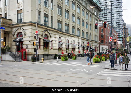 Queen Street near the Roy Thomson Hall in Toronto, Ontario, Canada I Toronto City, Downtown in Ontario, Canada, North America Stock Photo