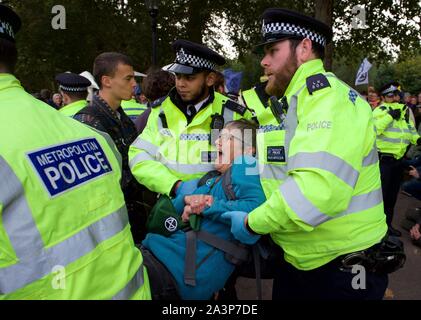 London, UK. 9th Oct, 2019. Police arrest Extinction Rebellion protesters in London on 09 October 2019 in London, England. Protesters plan to blockade the London government district for a two week period, as part of 'International Rebellion' taking place in over 60 cities around the world, calling for decisive and immediate action from governments in the face of climate and ecological emergency. Photo by Alan Stanford. Credit: PRiME Media Images/Alamy Live News Stock Photo