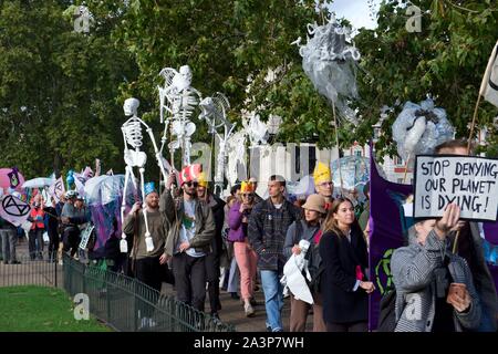 London, UK. 09th Oct, 2019. Environmental activists from Extinction Rebellion protest marching in London on 09 October 2019 in London, England. Protesters plan to blockade the London government district for a two week period, as part of 'International Rebellion' taking place in over 60 cities around the world, calling for decisive and immediate action from governments in the face of climate and ecological emergency. Photo by Alan Stanford. Credit: PRiME Media Images/Alamy Live News Stock Photo