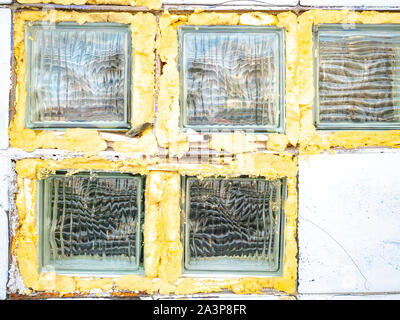 Glass blocks in a brick wall. Place for text. Background. Stock Photo
