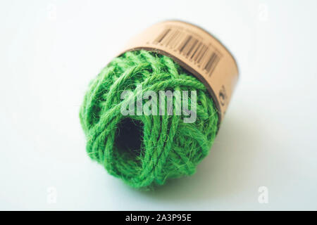 Green yarn balls as isolated white background, close up Stock Photo