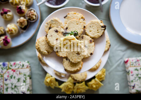 Multi tier platter of scones set out ready for a sophisticated party Stock Photo