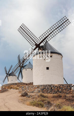 vertical view of old windmills on Calderico hill of the spanish municipality of Consuegra. these windmills are a touristic landmark in the province of Stock Photo