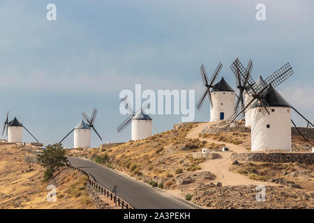 horizontal view of old windmills on Calderico hill of the spanish municipality of Consuegra. these windmills are a touristic landmark in the province Stock Photo