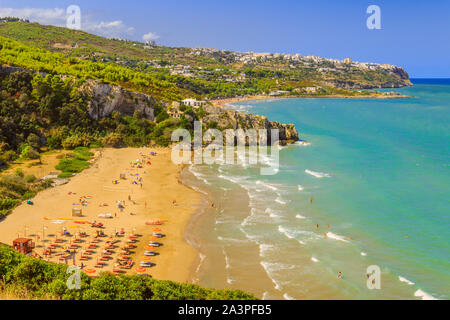 The most beautiful beaches of Apulia: Zaiana Bay, enclosed by two rocks, stretches a few kilometres away from Peschici, in Gargano, Italy. Stock Photo