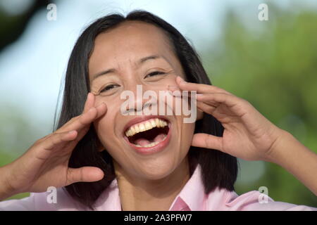 Youthful Filipina Female Singing Stock Photo