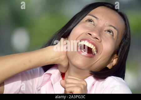 An Asian Woman Laughing Stock Photo