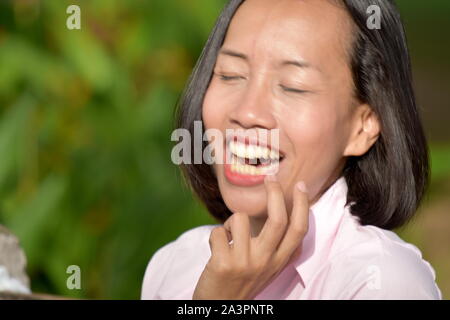 Shy Asian Female Woman Stock Photo