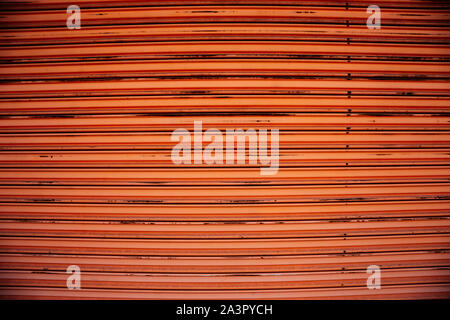Red metal shutter door texture background Stock Photo