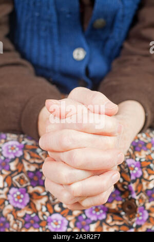 Young doctor holds the old woman's hand Stock Photo