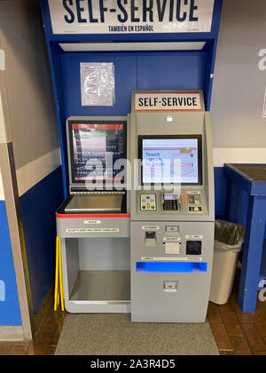 Orlando,FL/USA-10/7/19:  A self service postage machine in an United States Postal Service, USPS, office next to an international airport in the city Stock Photo