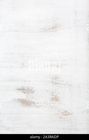 Peeling paint on an old white wooden wall. Stock Photo