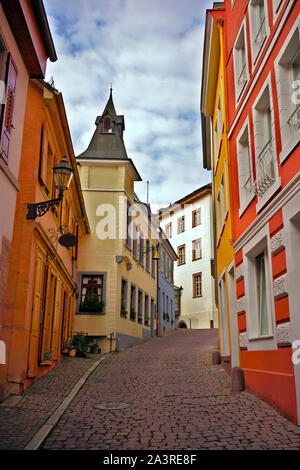 Romantic cobblestone alley with colorful houses in the old town of Baden-Baden, Baden-Wurttemberg, Germany.