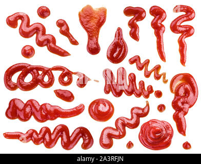 Set of ketchup puddles and ketchup splashes isolated on white background. Stock Photo