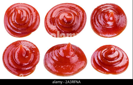 Set of tomato sauce or ketchup puddles isolated on white background. Stock Photo