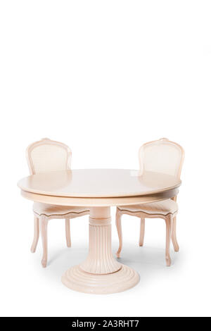 Old fashioned wood table and chairs on the white background. Stock Photo