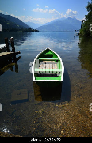 Green row boat at the Zeller See, Zell am See, Salzburg, Austria, Europe Stock Photo