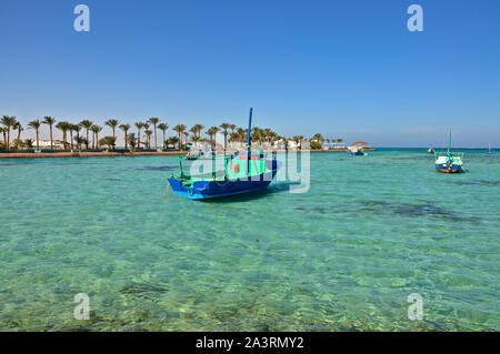 The scenic view of colorful boats in Hurghada beach. Egypt. Stock Photo