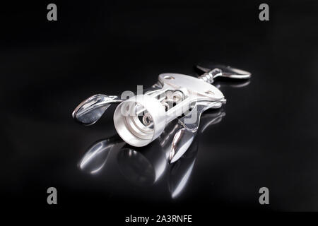 Elegant corkscrew on the dark background. Stock Photo