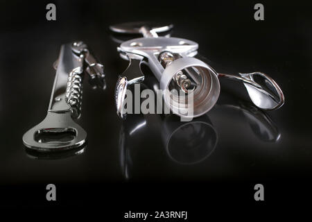 Elegant corkscrews on the dark background. Stock Photo