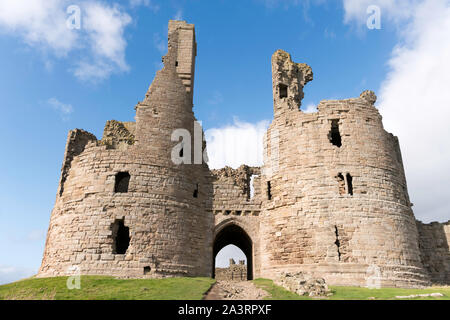The gatehouse of Dunstanburgh castle, Northumberland, England, UK Stock Photo