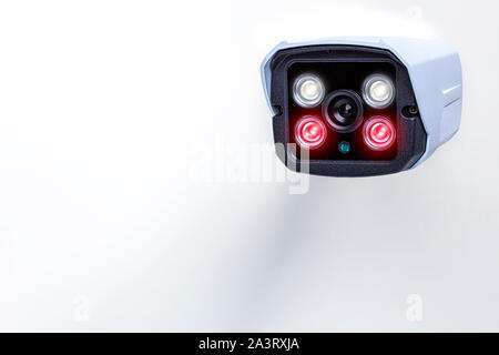 detail of a surveillance camera with infrared technology for night vision on a white background. Stock Photo