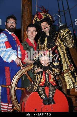 Photo Must Be Credited ©Kate Green/Alpha Press 079965 30/11/2015 Jarred Christmas as Smee, George Ure as Peter Pan, Verne Troyer as Lofty the Pirate and Marcus Brigstocke as Captain Hook at the press launch of the New Wimbledon Theatre Pantomime Peter Pan held at the Golden Hinder II Galleon in London. Stock Photo