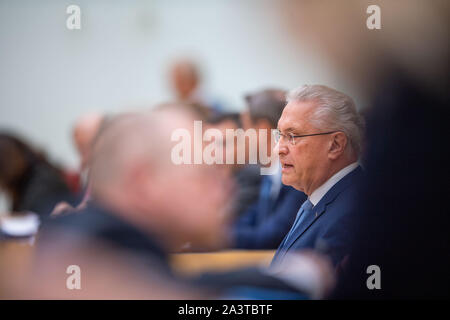 Munich, Germany. 10th Oct, 2019. Joachim Herrmann (CSU), Minister of the Interior of Bavaria, speaks at the plenary session of the Bavarian Parliament. Credit: Lino Mirgeler/dpa/Alamy Live News Stock Photo