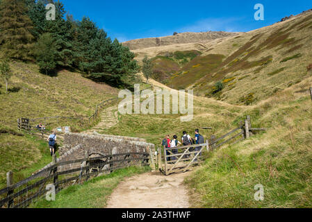 Young walkers at Jacobs Ladder on the Pennine Way, Edale, Peak District, Derbyshire, England. Stock Photo