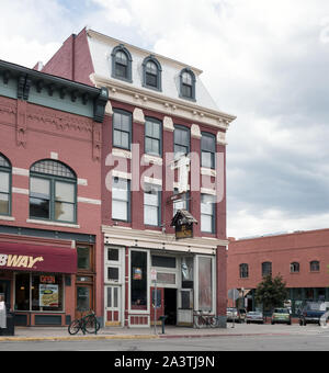 The  1892 building (right) constructed as the Central Hotel and now housing the El Rancho Tavern on Main Avenue in Durango, the seat of La Plata County in southern Colorado Stock Photo