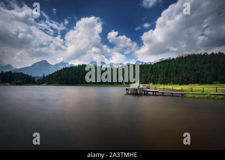 Footbridge over the Lake of Staz near St. Moritz in Switzerland Stock Photo