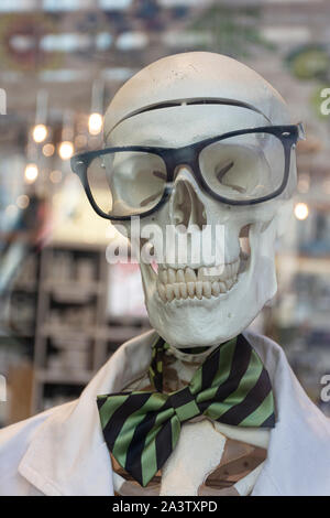 Head of a Human skull with black glasses Stock Photo
