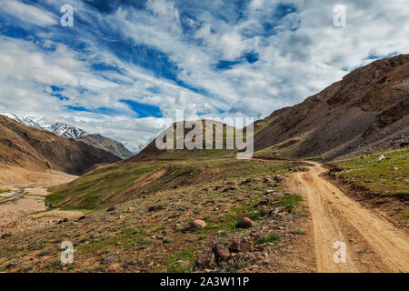 Dirt road in Spiti valley in Himalayas Stock Photo