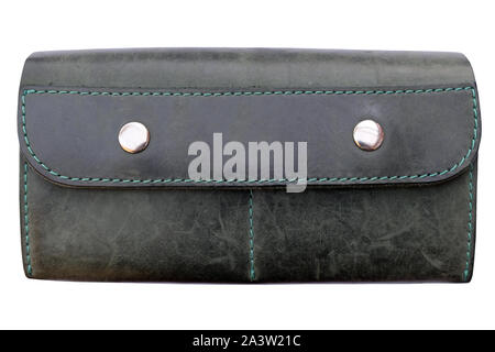 Dark green leather wallet with two metal buttons, isolate. Large women's wallet, small clutch closed. Stock Photo