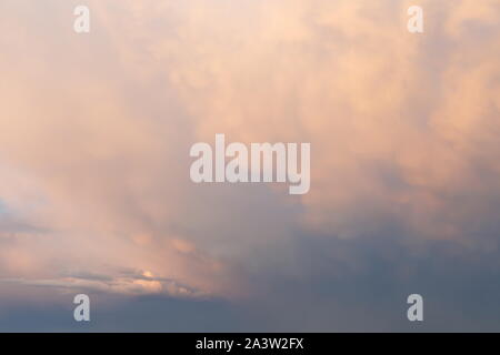 Big and thick clouds on the horizon. Blue sky with thick clouds Stock Photo
