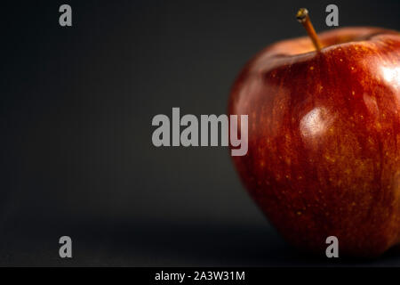 Red apple on dark background Stock Photo