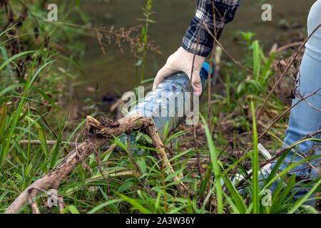 plastic bottle floating in water, cleaning earth concept Stock Photo