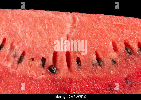 slice of watermelon on black background Stock Photo