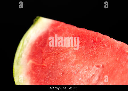 slice of watermelon on black background Stock Photo