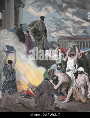 Saint Paul and the burning of pagans books at Ephesus. Acts 19:19. Engraving. Bible Illustration by Gustave Dore. 19th century. Stock Photo