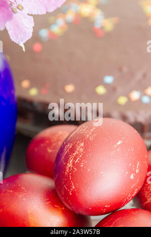 Dyed eggs in onion skins are at the plate Stock Photo