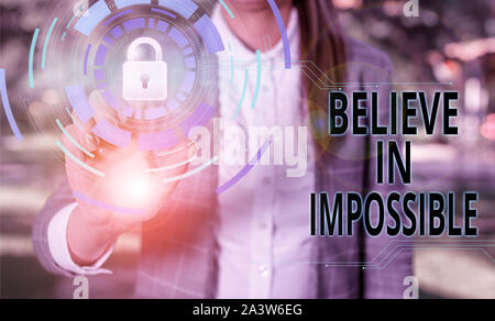 Handwriting text Believe In Impossible. Conceptual photo You can do it everything is possible Work hard Female human wear formal work suit presenting Stock Photo