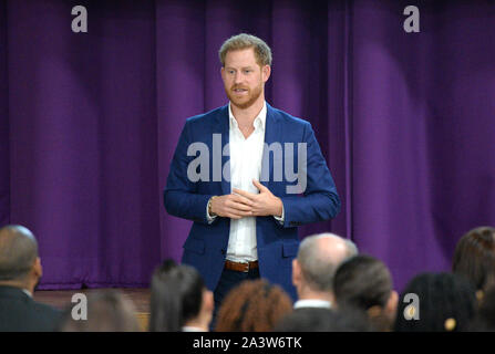 The Duke of Sussex attends a school assembly with Year 11 students during a visit to the Nottingham Academy during his visit to mark World Mental Health Day. Stock Photo